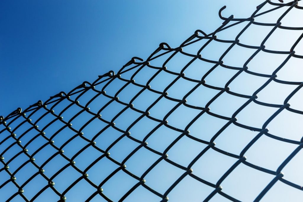 reliable chain link and wooden fence